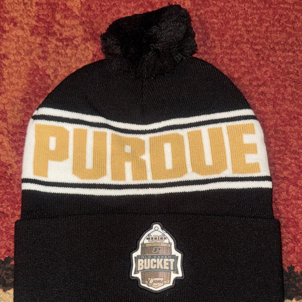 Purdue Boilermakers beanie with a "100th Bucket Game" patch.